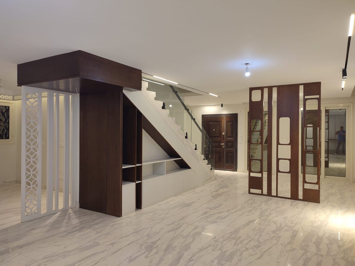 Interior with staircase, timber joinery and screens